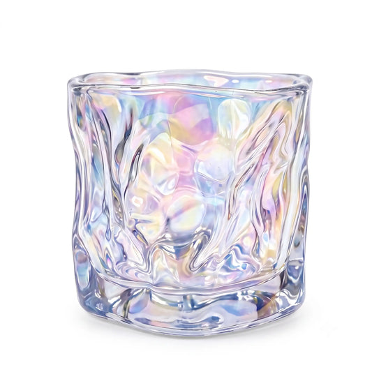 Wholesale iridescent prism artisan glass candle vessel 6.5 oz casting rainbow light reflections under spotlight