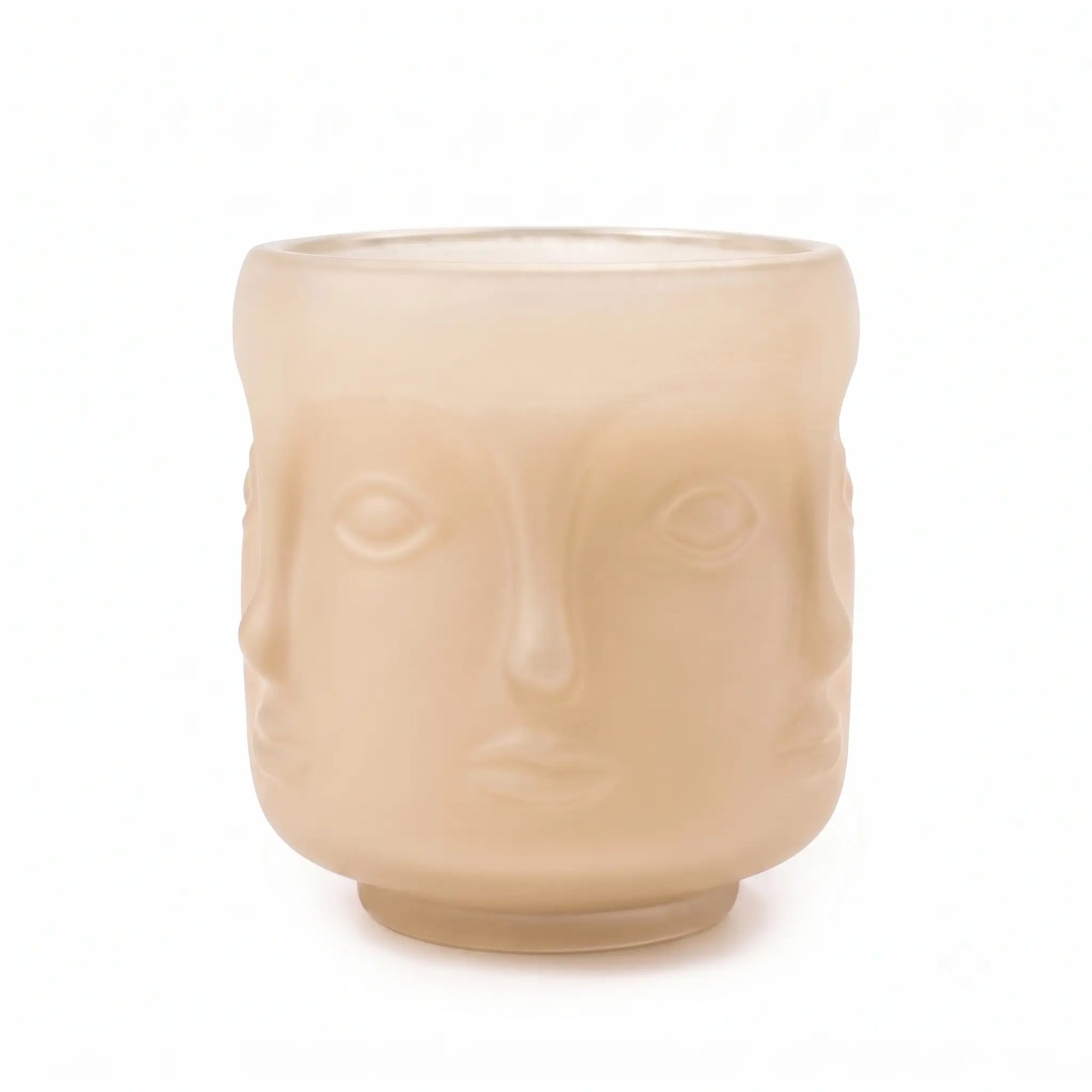 Wholesale oat colored 3D sculptural face glass candle vessel 3.5 oz under spotlight
