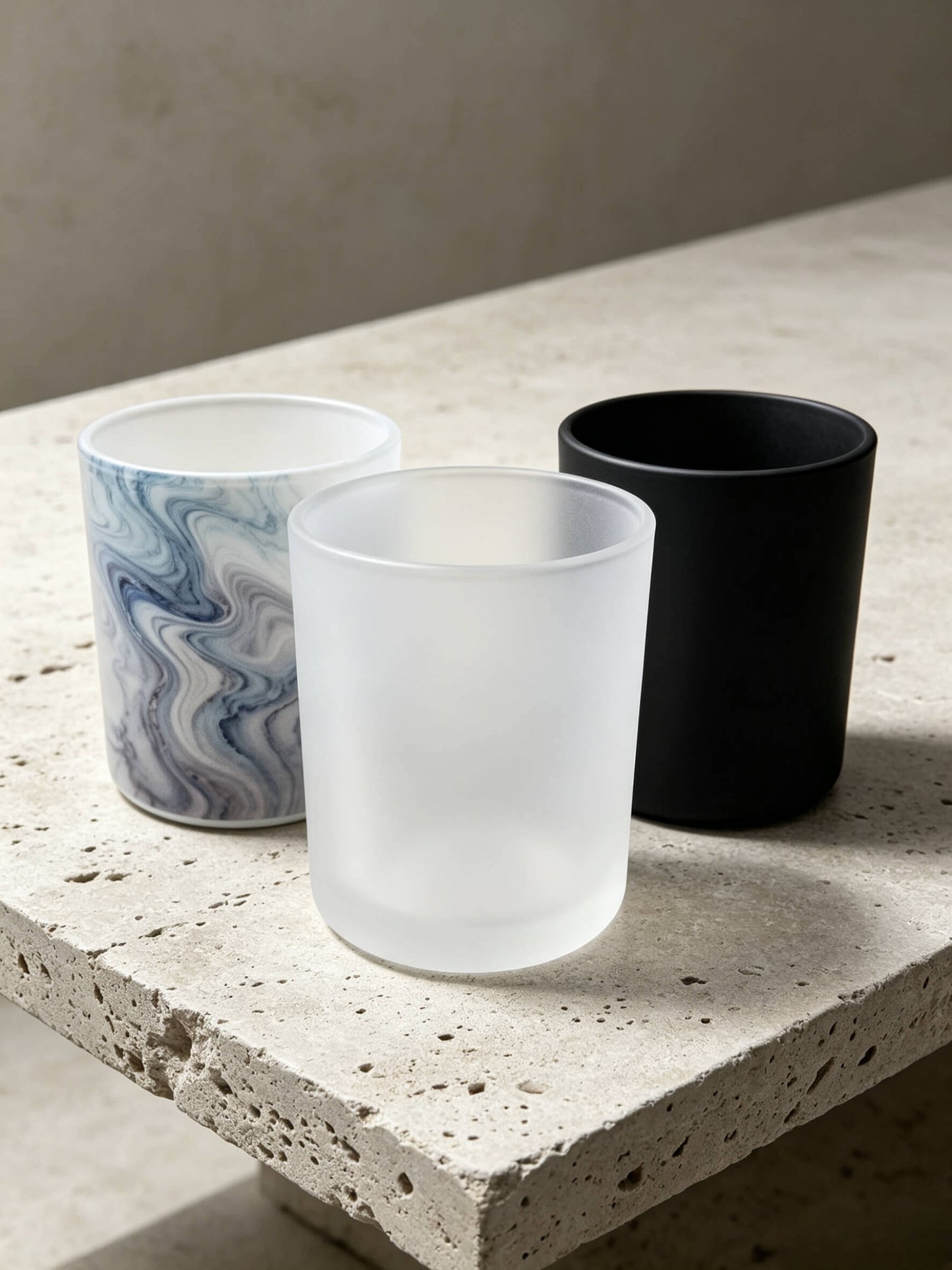 Premium candle vessel trio collection featuring blue marble frosted white and matte black finishes for wholesale branding