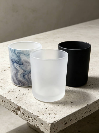 Premium candle vessel trio collection featuring blue marble frosted white and matte black finishes for wholesale branding